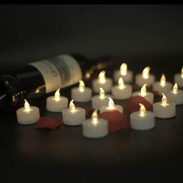 Alt view image 4 of 7 - Battery Operated Flameless Tea Lights,Warm White 24Pack for Decoration | Flickering Electric Votive Candle Realistic and Bright for Seasonal, Festive Celebrations and Holiday Gifts Long Lasting