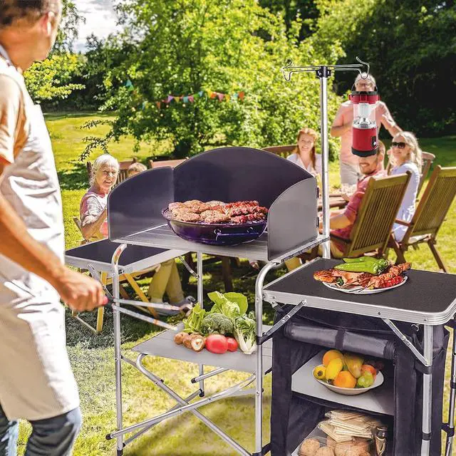 Alt view image 2 of 7 - Black Foldable Aluminum Outdoor Camping Cooking Station With ThreeSided Windscreen Side Shelves and Fabric Storage Cabinet For Picnic BBQ RV Outdoor Cooking