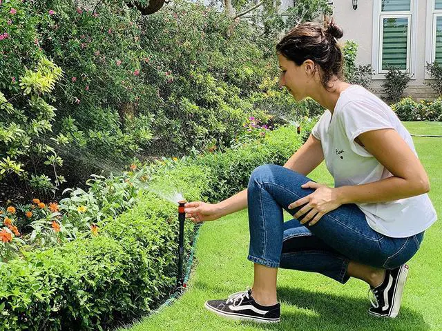 Alt view image 4 of 7 - Flexible DIY Garden Sprinkler System with Hose and Accessories, Multi-Adjustable Sprinkler Heads for Lawn Plant Watering, Covers Up to 1650 Sq. Ft