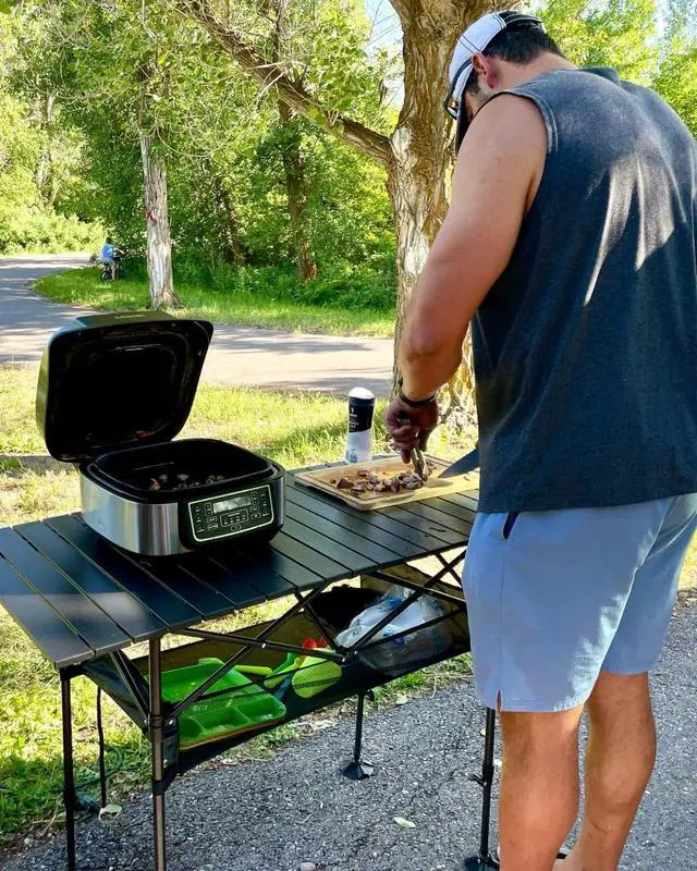 Alt view image 2 of 7 - Folding Aluminum Roll-Up Camping Table with Adjustable Height, Portable Picnic Table with Large Storage and Carrying Bag for Camping BBQ Beach Backyard Use