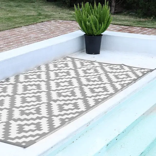 Alt view image 4 of 6 - 9 x 18 Ft Gray White Reversible Polypropylene Outdoor Rug Waterproof Foldable Floor Mat With Corner Loops and 4 Ground Stakes For Patio RV Beach Picnic Backyard Deck