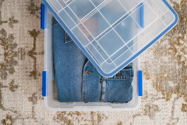 Alt view image 5 of 7 - 3-Pack 26.5 Qt Storage Bins with Gasket Lids, Clear/Blue | WeatherPro seal protects everyday essentials in closets, offices and laundry rooms