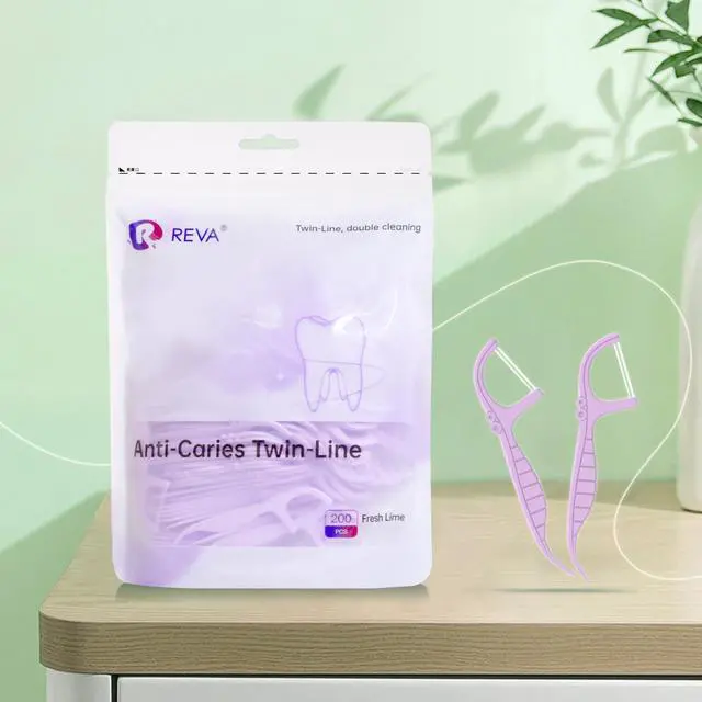 Alt view image 2 of 7 - Anti-Caries Twin-Line Dental Floss Picks - 200 Count (Pack of 1), Fresh Lime Flavour Toothpicks, Teeth Cleaning Sticks