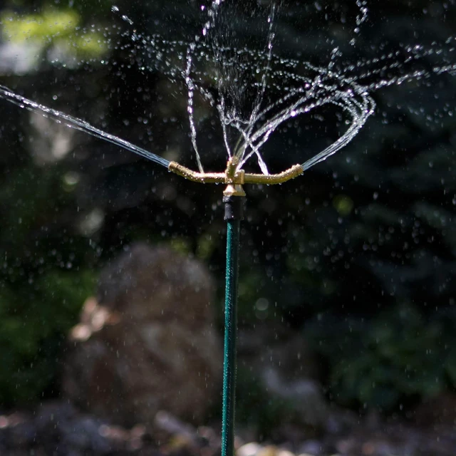 Alt view image 3 of 6 - Orbit 3-Arm Rotating Lawn Sprinkler on Adjustable Step Spike