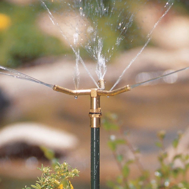 Alt view image 2 of 6 - Orbit 3-Arm Rotating Lawn Sprinkler on Adjustable Step Spike