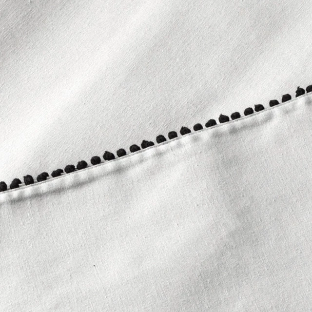 Alt view image 5 of 5 - 102" Rectangle Tablecloth Thyme & Table Ivory with Black Pom Pom Trim