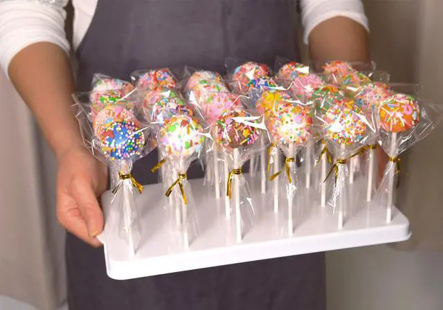 Alt view image 5 of 7 - Cake Pop Stand Kit, 24 Holes Lollipop Display Holder with 100 Pcs Cake Pop Sticks, 100 Pcs Wrappers Bags, 100 Pcs Gold Twist Ties (White)