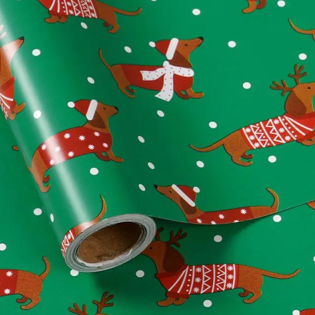 Main image of CozyNestFinds Christmas Dachshund Wrapping Paper Mini Roll, Dachshund Dressed in Festive Customes, White Snow-dot Xmas Green Design, Holiday Party Gift Wrap for Kids Boys Girls, 17 inches x 16.4 Feet