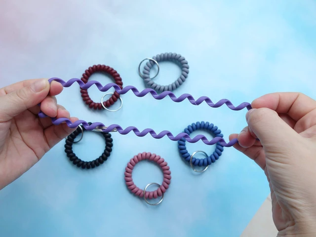 Alt view image 6 of 6 - HAMIYELL Pack of 6 Plastic Coil Spring Key Chains - Stretchable Spiral Key Rings and Holders (Pink)