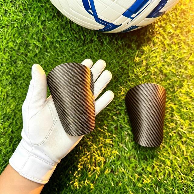 Alt view image 6 of 7 - Mini Soccer Shin Guards, Extra Mini Football Shin,Carbon Fiber Shin Pads Indoor Outdoor Football Soccer Training Protective Equipment for Men, Women, Youths (3.74" x 2.36")