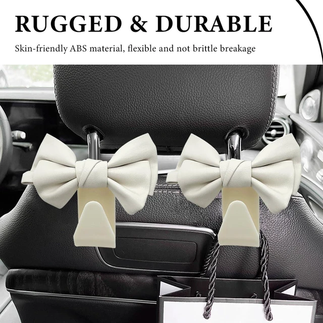 Alt view image 4 of 6 - 2 PCS Car Seat Headrest Hooks, Cute Bow Shaped Vehicle Backseat Purse Holder Storage Hook, Bow Knot Seat Back Hooks Hanging Organizer for Coat Umbrellas Grocery Bag (White)