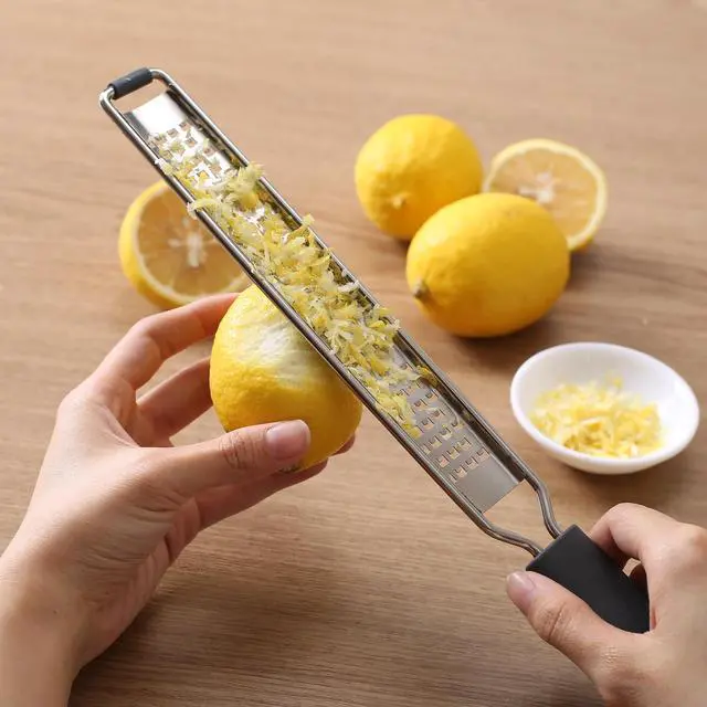 Alt view image 4 of 7 - Zester Grater, Fine Stainless Steel Lemon Zester | Cheese shredder for Kitchen, Ideal for parmesan, Garlic, Nutmeg, Chocolate, Fruits, Vegetables Black