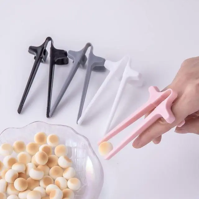 Alt view image 6 of 7 - 4pcs Finger Snack Chopsticks for Gamer,Snack Clips,Gaming Finger Tongs,Gaming Finger Sleeves,Gamer Gifts,Cell Phones Accessories