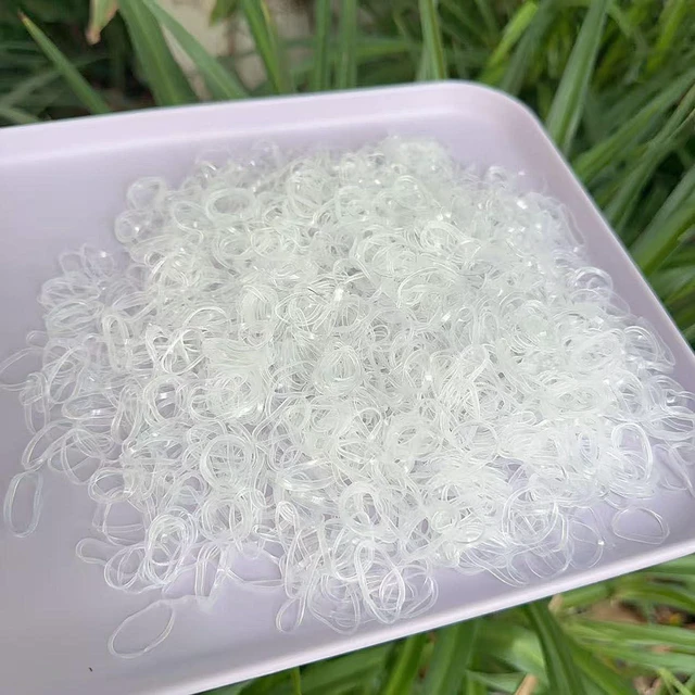 Alt view image 7 of 7 - 2000PCS Little Elastic Hair Bands for Girls Kids Toddler Women Soft TPU Rubber Bands No Damage No Crease Hair Ties for Braiding Ponytails Includes 2 Topsy Tail Tools Small Accessories (Clear)