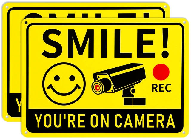 Main image of 2 Pack Smile You're on Camera Signs Video Surveillance Signs Outdoor, 10"x7" Rust-Free Aluminum Warning Sign, UV Printed Weatherproof Security Camera Sign for Home, Business, Fence, Driveway, CCTV