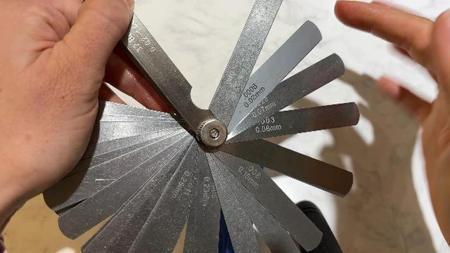 Alt view image 3 of 3 - Stainless Steel Feeler Gauge Universal Standard SAE and Metric Offset Valve Thickness Gauge 32-Piece Blade Tool for Measuring Gap Width/Thickness