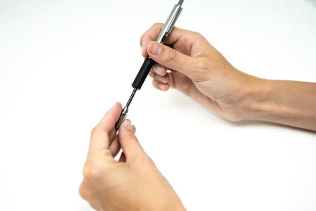 Alt view image 5 of 6 - STEEL F-402 Retractable Ballpoint Pen, Blue Ink, 0.7mm, 12-Pack Stainless Steel Barrel, Comfort Grip, Easy-Glide Ink, Fine Point, Professional Design, Ideal for Journals & Planners (29220)