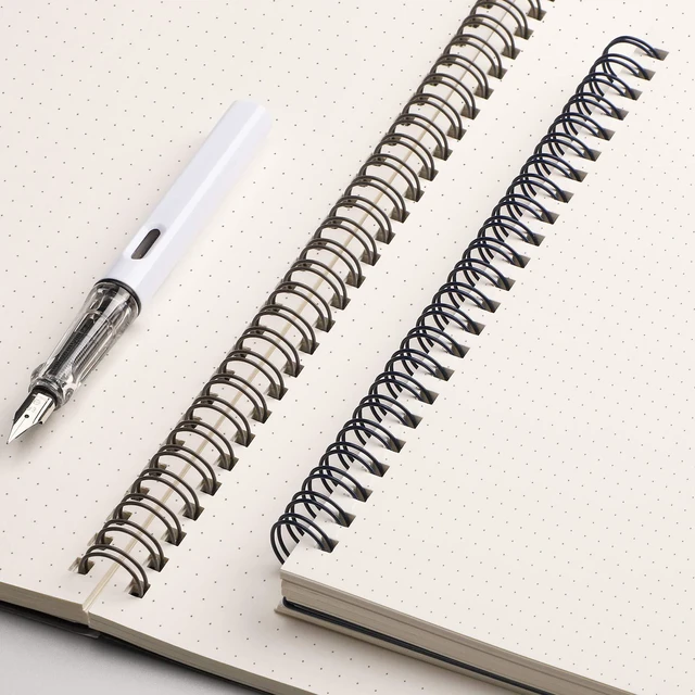 Alt view image 4 of 7 - Dotted Spiral Journal Notebook, 2 Pack, 320 Pages, B5 (7.4" x 10") 100 GSM Thick Paper, Flexible Plastic Cover, for Journaling, Planning, Tracking & Sketching (Brown & Blue)