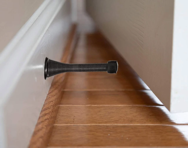 Alt view image 5 of 6 - 16 Pack Spring Door Stops 3 1/4 Inch Flexible Heavy Duty Spring Door Stopper with RustProof Screw Rubber Bumper Tips (Black)