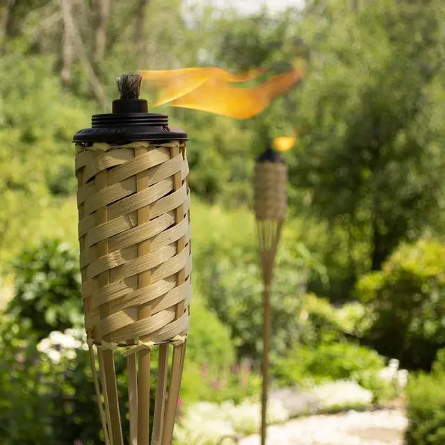 Alt view image 5 of 6 - Bamboo Torches 12-Pack Weather-Resistant Outdoor Décor with Easy-Pour Wide-Mouth Canister Refill for Patio, Garden, Backyard, and Parties, 57-Inch Citronella Torches