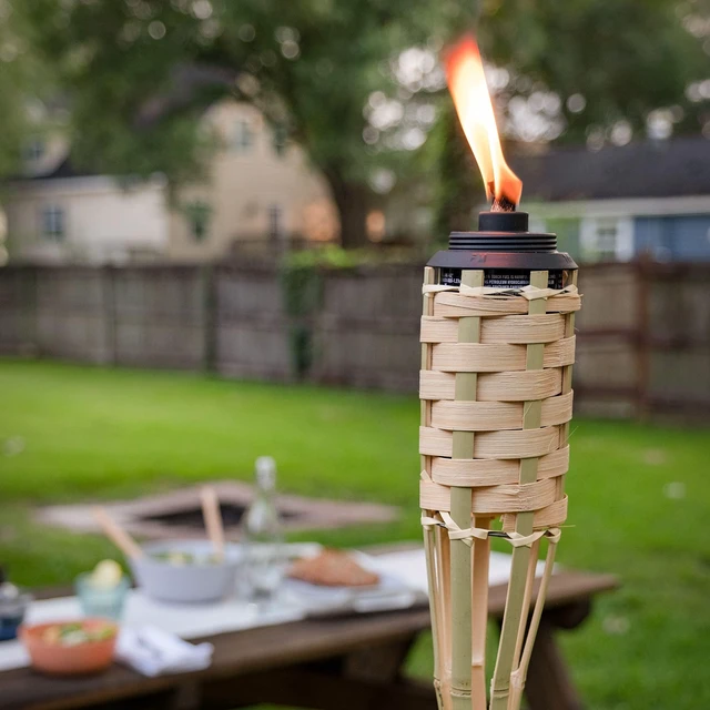 Alt view image 2 of 7 - Bamboo Torches 8-Pack Weather-Resistant Outdoor Décor with Easy-Pour Wide-Mouth Canister Refill for Patio, Garden, Backyard, and Parties, 57-Inch Citronella Torches