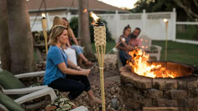 Alt view image 5 of 7 - Bamboo Torches 8-Pack Weather-Resistant Outdoor Décor with Easy-Pour Wide-Mouth Canister Refill for Patio, Garden, Backyard, and Parties, 57-Inch Citronella Torches