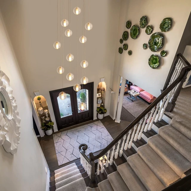 Alt view image 2 of 7 - 14 Lights Staircase Chandelier for High Ceiling, Dimmable Modern Crystal Raindrop Large Long Hanging Pendant Light for Stairwell Living Room Stair Foyer, Bulbs Included (Nickel Canopy)