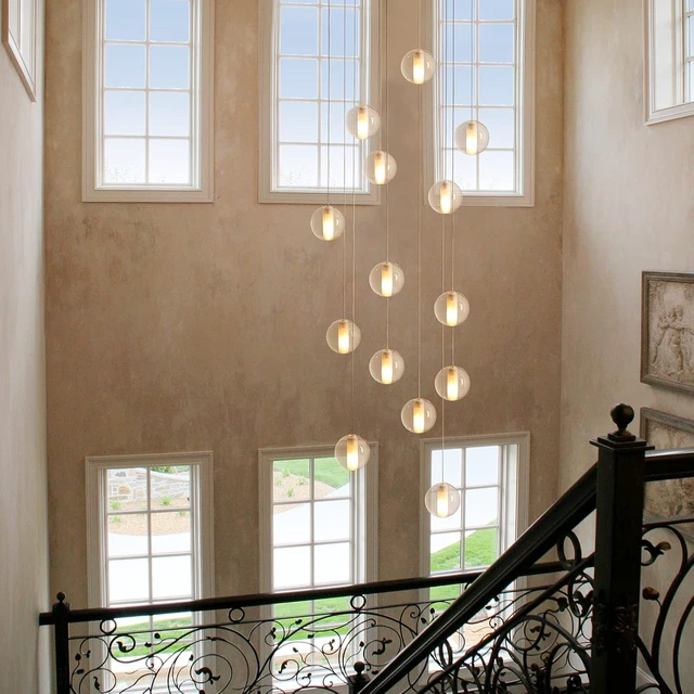 Alt view image 3 of 7 - 14 Lights Staircase Chandelier for High Ceiling, Dimmable Modern Crystal Raindrop Large Long Hanging Pendant Light for Stairwell Living Room Stair Foyer, Bulbs Included (Nickel Canopy)