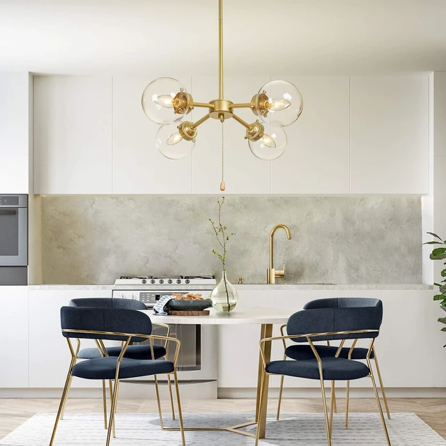 Alt view image 2 of 7 - KSANA Gold Globe Chandelier with On/Off Switch Pull Chain, 4-Light Modern Gold Semi Flush Mount Ceiling Light with Clear Globe Glass Shades for Dining Room & Kitchen, Soft Gold, 19.5 Dia