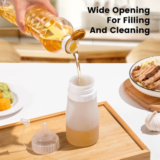 Alt view image 5 of 7 - 12 oz Silicone Squeeze Bottles for Sauces & Oil, 4 Pack, Grey | Leak Proof Condiment Containers, Interchangeable Extra Lid, Food Grade, BPA Free Easy Squeeze for Honey, Ketchup & Dressing