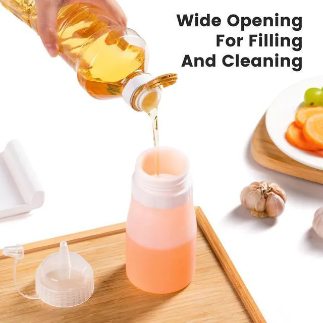 Alt view image 5 of 7 - 12oz Silicone Squeeze Bottles for Sauces & Oil, 4 Pack, Pink | Leak Proof Condiment Containers, Interchangeable Extra Lid, Food Grade, BPA Free Easy Squeeze for Honey, Ketchup & Dressing