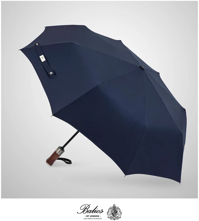 Alt view image 2 of 7 - Folding Umbrella Lux Hardwood Handle Auto Open Close Dark Navy | Patented handmade handle in richly grained solid hardwood, with stainless steel tip and wrist strap. Designed in London.