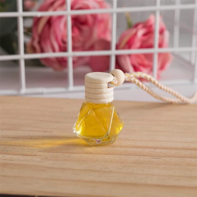Alt view image 5 of 7 - 4Pcs 8ml Hanging Car Air Freshener Bottle Scent Essential Oil Car Diffuser with Wooden Cap Glass Vial Pendant for Aromatherapy