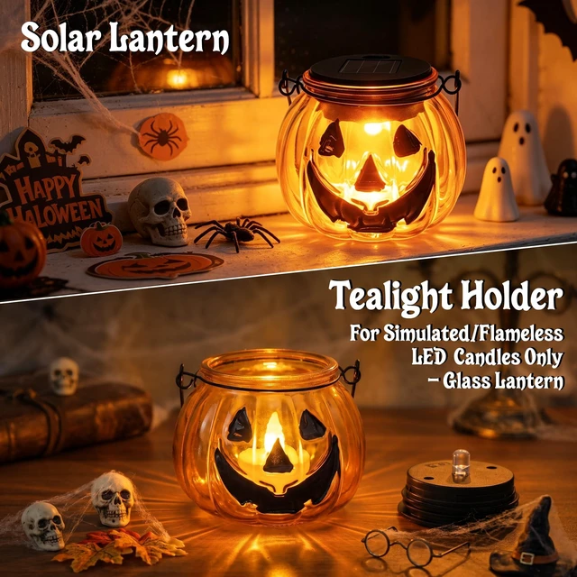 Alt view image 2 of 7 - Halloween Pumpkin Solar Lantern, 2 Pack Glass Hanging Light Outdoor | Orange Pumpkin JackO'-Lantern with Spooky Grin Face Projection; Tabletop Lamp; Auto On/Off; IP44 Waterproof; Warm White Glow