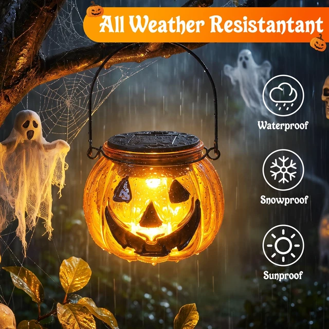 Alt view image 4 of 7 - Halloween Pumpkin Solar Lantern, 2 Pack Glass Hanging Light Outdoor | Orange Pumpkin JackO'-Lantern with Spooky Grin Face Projection; Tabletop Lamp; Auto On/Off; IP44 Waterproof; Warm White Glow