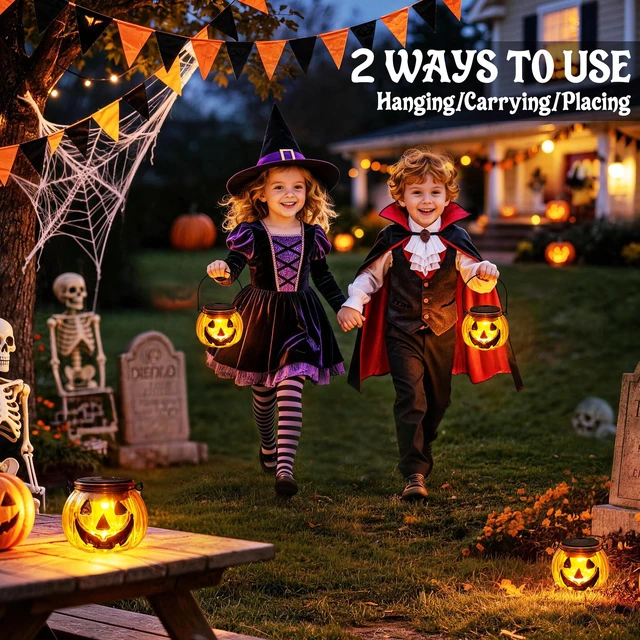 Alt view image 5 of 7 - Halloween Pumpkin Solar Lantern, 2 Pack Glass Hanging Light Outdoor | Orange Pumpkin JackO'-Lantern with Spooky Grin Face Projection; Tabletop Lamp; Auto On/Off; IP44 Waterproof; Warm White Glow