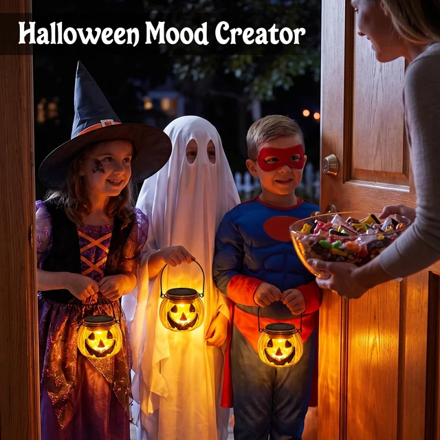 Alt view image 7 of 7 - Halloween Pumpkin Solar Lantern, 2 Pack Glass Hanging Light Outdoor | Orange Pumpkin JackO'-Lantern with Spooky Grin Face Projection; Tabletop Lamp; Auto On/Off; IP44 Waterproof; Warm White Glow