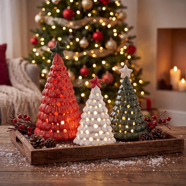 Alt view image 6 of 7 - 3 Pcs Mini Lighted Ceramic Christmas Tree Figurines, Red White Green
Illuminated Festive Display Decor with Star Toppers and Warm LED Glow for Tabletops, Mantels, Shelves and Centerpieces