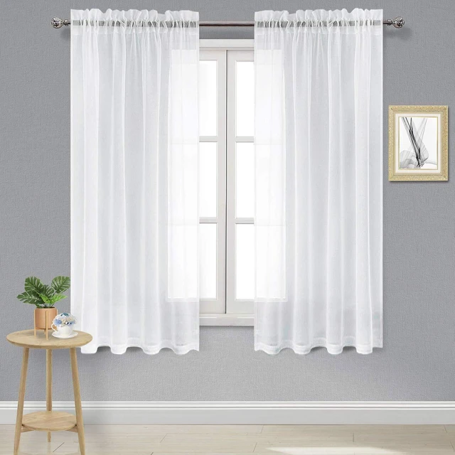 Main image of White Sheer Curtains 63 Inch Long for Living Room Rod Pocket 2 Panels
Light Filtering Voile Drapes for Bedroom/Living Room Airy Lightweight Elegant Window Treatments, 52" W x 63" L
