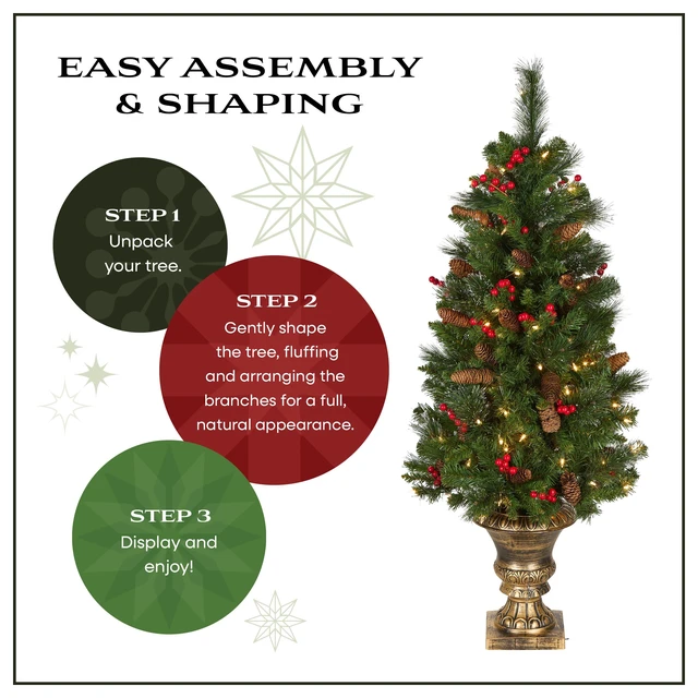 Alt view image 4 of 5 - 4ft Pre-Lit Crestwood Spruce Christmas Entrance Tree
100 Clear Lights, 230 Tips, Artificial Christmas Decoration with Glitter, Pinecones, Red Berries, Gold Pedestal Base, Green
