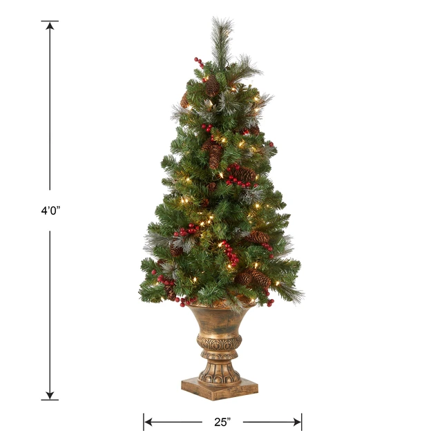 Alt view image 5 of 5 - 4ft Pre-Lit Crestwood Spruce Christmas Entrance Tree
100 Clear Lights, 230 Tips, Artificial Christmas Decoration with Glitter, Pinecones, Red Berries, Gold Pedestal Base, Green