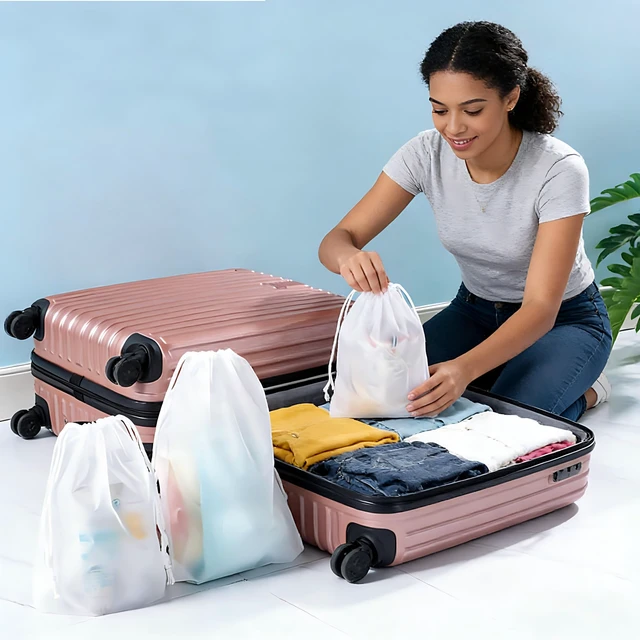 Alt view image 5 of 6 - 15-Piece Travel Storage Bags, White Frosted, 3 Sizes | Drawstring Closure, For Gym Clothes, Underwear, Shoes, 5 Pieces Each Size, 15.7 x 11.8 in; 7.9 x 11.8 in; 7.0 x 9.8 in