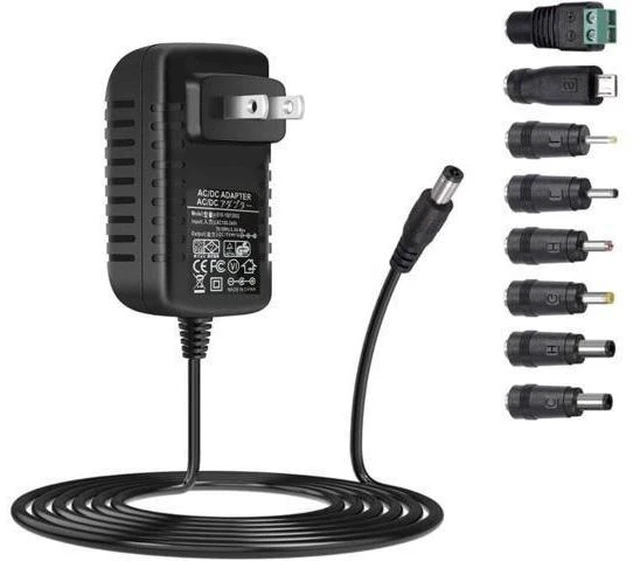 Main image of Universal AC-DC Power Adapter 15V 1A 15W AC100V-240V 50/60Hz Input DC15V 100mA-1000mA Output 5.5mm x 2.1mm Plug with 8 DC Plug Adapters Inner Positive Outer Negative