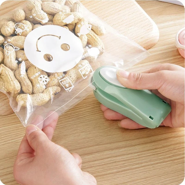 Alt view image 2 of 4 - Mini Hand Press Heat Sealer Portable Plastic Bag Sealing Machine Food Snack Bag Sealer Clip Food Packaging Heat Sealing Tool Compact Kitchen Storage Sealer Green