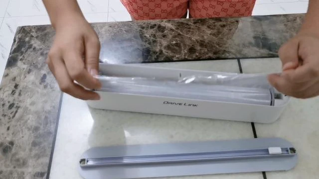 Alt view image 4 of 6 - Refillable Magnetic Plastic Wrap Dispenser With Slide Cutter, Sturdy Food Cling Film Cutter, Press and Seal Wrap, 12" x 328' Roll BPA Free