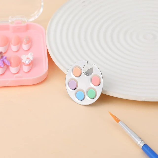 Alt view image 5 of 7 - Piriuuo 4 Pack Mini Nail Art Palette, Nail Polish Mixing Plate Metal Manicure Palettes Tools with Finger Rings Nails Art Tools Makeup Palette for Mixing Nail-Art Foundation Cosmetic