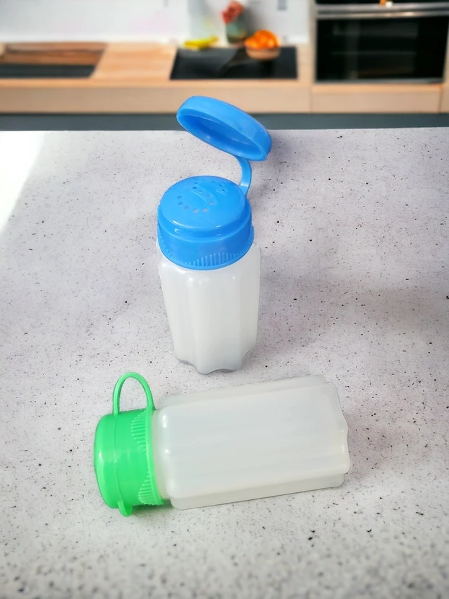 Alt view image 2 of 2 - Handy Housewares Spill-Proof Flip-Lid Mini Salt & Pepper Shakers | Compact Durable Plastic Travel Spice Dispenser Set for Lunch Bags, Camping & Outdoor Cooking | Blue and Green (1 Pair)