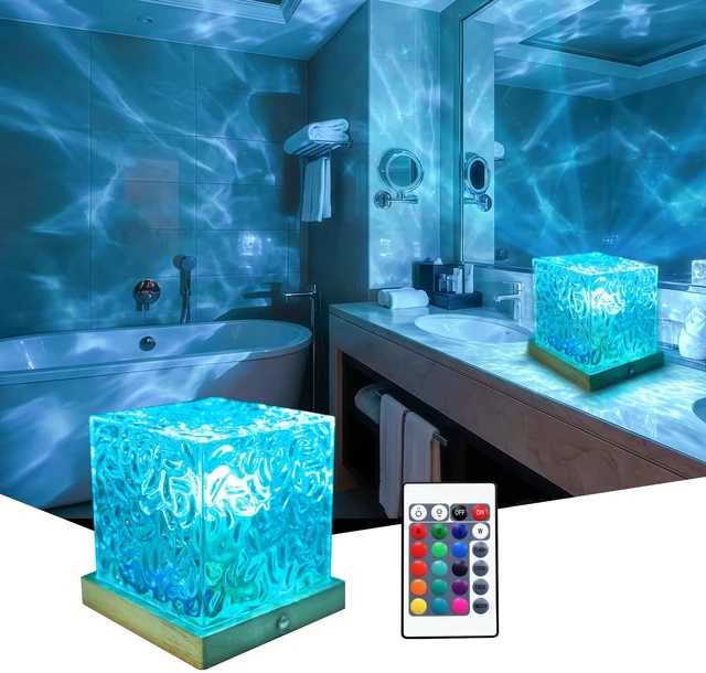 Main image of Ocean Wave Projector Light, 16 Colors Rotating Water Lamp, Remote Beach Decor Sea Themed Gradual Northern Lights Projector for Office Bedroom Bar Restaurant (Cordless)