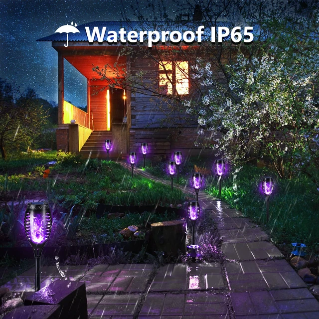Alt view image 6 of 7 - Solar Torch Flame Lights, 12 Pack Solar Halloween Lights Outdoor with Flickering Flame, Waterproof Patio Light Landscape Decoration Lighting for Garden Yard Outdoor Halloween Decor - Purple