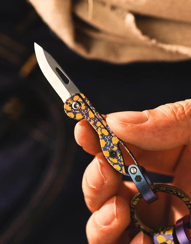 Alt view image 4 of 7 - KK05 Titanium Mini Pocket Knife, 1.06-Inch Blade, Skull Lightweight EDC Knife for opening packages and snack wrappers, removing clothing tags, and handling everyday tasks